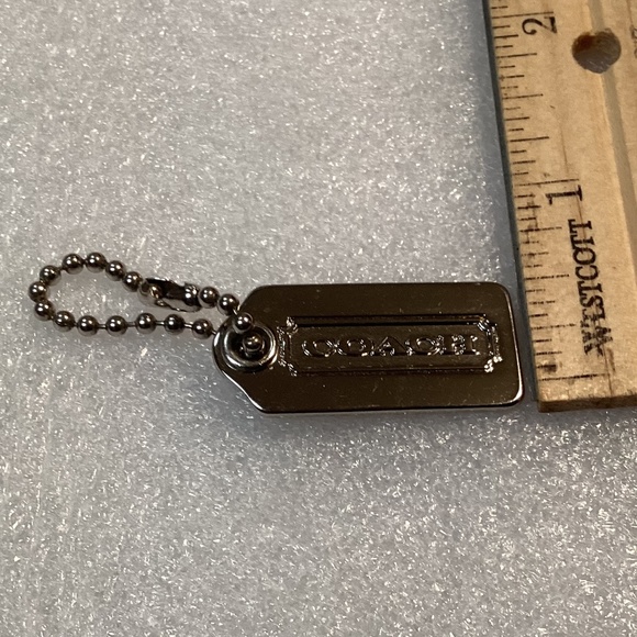 Coach Metal Bag Tag/Hang Tag 1.25”x 0.5” - Picture 4 of 14